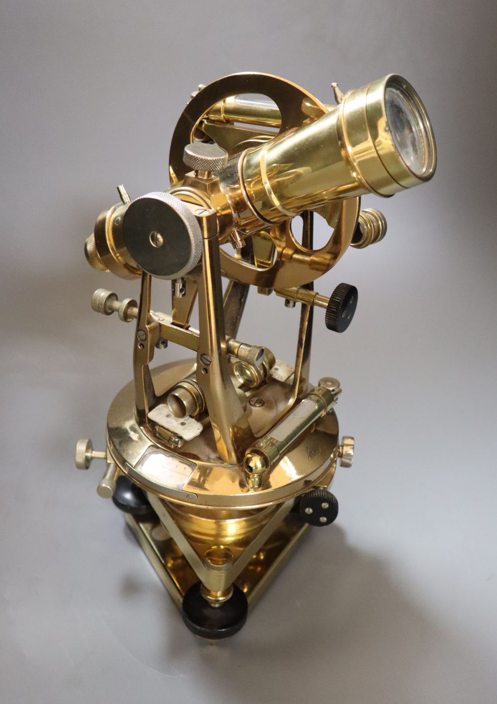 A brass theodolite, signed, Watts & Sons, London, height 32cm